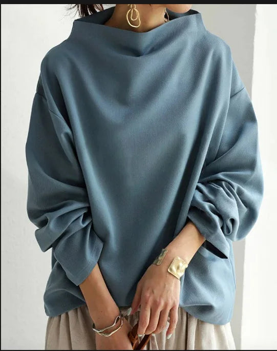 Haut femme bleu col roulé oversize tendance printemps